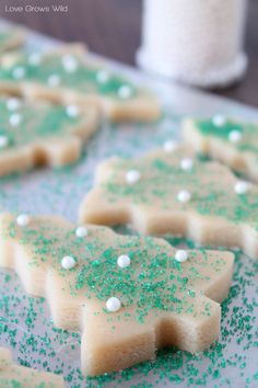 green and white sugar cookies with sprinkles