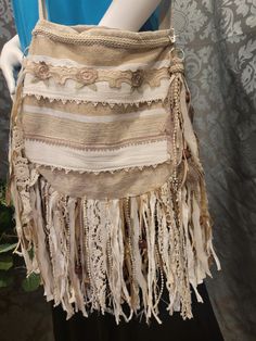 This stunning boho crossbody handbag has an extra long strap. Made from very durable materials with exterior and interior pockets It has a magnetic closure. . Bohemian Beige Bag With Fringe, Beige Fringed Hobo Tote Bag, Bohemian Hobo Bag With Tassels, Bohemian Festival Bags With Beaded Fringe, Bohemian Beige Fringe Shoulder Bag, Bohemian Beige Fringed Shoulder Bag, Beige Bohemian Crossbody Hobo Bag, Bohemian Hobo Bag With Fringe For Travel, Bohemian Bags With Beaded Fringe For Everyday Use