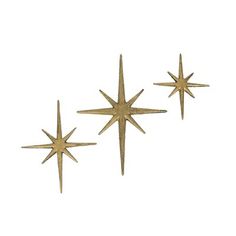 three metal stars on a white background