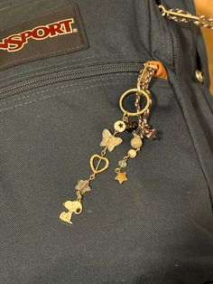 a close up of a chain attached to a backpack with the word sport on it