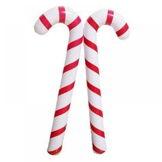 two large candy canes on a white background