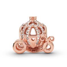 Show up to the ball in style with the Disney Cinderella Sparkling Carriage Charm. Designed to celebrate the 70th anniversary of Disney’s Cinderella, this piece is hand-finished in 14K rose gold-plating. Shaped like her pumpkin carriage, this openwork charm is decorated with clear cubic zirconia and features a 3D crown on its roof and ornamental wheels. Style this charm on your Pandora Moments bracelet with shimmering pieces in sterling silver for a magical mixed metal look. Pandora Logo, Pandora Rose, Charms Pandora, Pandora Disney, Disney Cinderella, Bracelet Pandora, New Charmed, Christmas Bead, Bracelet Charms