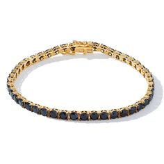 PRICES MAY VARY. Exquisite and Luxurious Design: Featuring a stunning 12.07ctw Black Spinel gemstone, this bracelet offers an elegant and sophisticated look that captivates with its timeless beauty and enchanting allure. High-Quality Craftsmanship: Crafted with high-quality 18k Yellow Gold Over Sterling Silver, this bracelet ensures a timeless and elegant appearance, blending exceptional durability with exquisite style. Versatile Accessory: Perfect for elevating any outfit, whether for a special Trendy Gold Jewelry, Black Spinel Bracelet, Spinel Gemstone, Birthstone Bracelet, August Birthstone, Birthstone Bracelets, Luxurious Design, Black Spinel, August Birth Stone