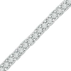 The traditional diamond tennis bracelet receives a modern update with this clever link design. Beautifully crafted in sleek sterling silver, each diamond shines from a unique setting that makes it appear larger. Bar-shaped details create a pleasing border around the diamonds. Radiant with 3 cts. t.w. of diamonds and a buffed to a brilliant luster, this jaw-dropping 7.25-inch style secures with a box clasp. Nameplate Necklace Silver, Zales Jewelry, Sparkly Bracelets, Expensive Jewelry Luxury, Trending Bracelets, Diamond Necklace Designs, Traditional Diamond, Swarovski Bracelet, Diamond Tennis Bracelet