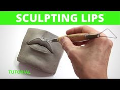 someone is painting the lips on a piece of leather