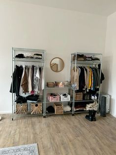 an organized closet with clothes and other items