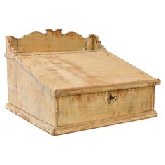 an old wooden bed with no sheets on the headboard and foot board, is isolated against a white background