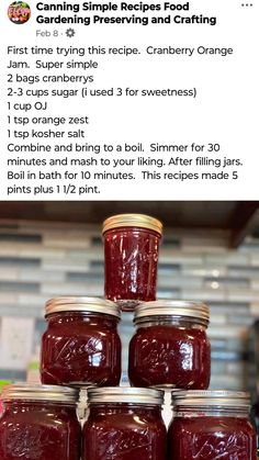 a stack of jars filled with jam sitting on top of a counter next to a sign that says canning simple recipes food