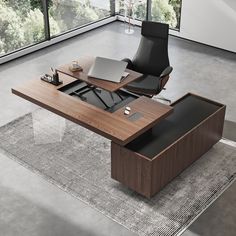 an office desk with a chair and laptop on it in front of a large window