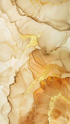 an abstract painting with gold and white colors