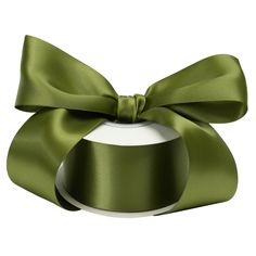 a green satin ribbon with a bow on it