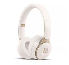 the beats on ear headphones are white and gold