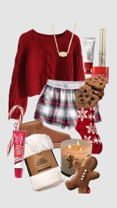 a woman wearing red sweater and plaid shorts with christmas items on the floor next to her