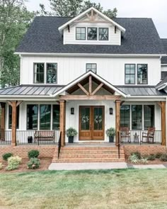 a large white house with two story windows