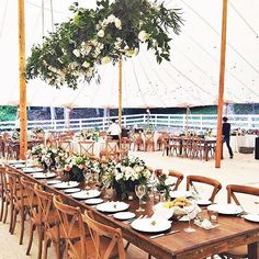 an outdoor dining area with tables and chairs