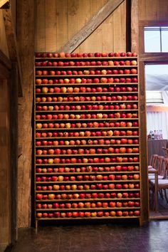 an old wooden crate filled with lots of apples