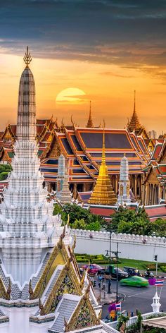 an aerial view of the grand palace in bangkok, thailand at sunset with many spires