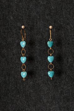 "Profile:  . . . . . . . . . . . . .. ... . . . . . . . . . . .. ... Materials: Magnesite heart beads in turquoise blue (12mm) linked by 18 ga. brass wire loops and jump rings suspend from gold plated stainless steel ear hooks. Full length top to bottom is 3.5\" (including hook). { Please note: these beads are not carved from natural turquoise stone, but are made to look similar to this historic material (dyed & stabilized magnesite has a similar matrix pattern and pop of color). One of the main Earring Making Ideas, Do Questions, Jewelry Design Ideas, Matrix Pattern, Full Length Top, Handmade Bead Jewellery, Diy Earrings Easy, Jump Ring Jewelry, Wire Jewelry Rings