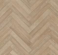 an image of wood flooring that looks like it is herringboneed in beige