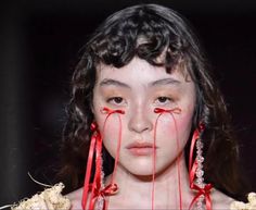 Simone Rocha Ribbon Tears, Simone Rocha Makeup, Ribbon Makeup Look, Ribbon Makeup, Simon Rocha, Ribbon Fashion, Twist Curls, Autumn Winter 2023, Christmas Hair