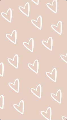 a pink background with white hearts on it