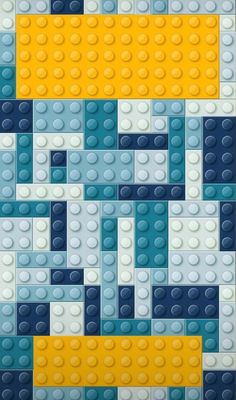 an image of a blue and yellow background with legos on it's sides