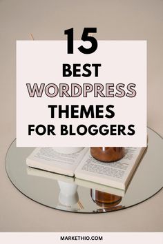 an open book with the title 15 best wordpress themes for bloggers on it