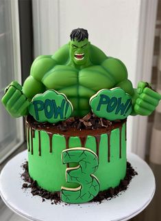 a hulk cake with the words pow on it