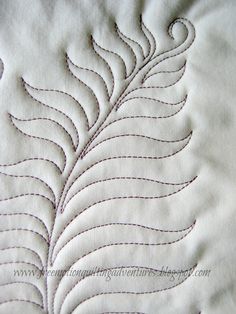 a close up view of a piece of fabric with stitching on it