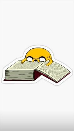 a book with a cartoon character sleeping on it