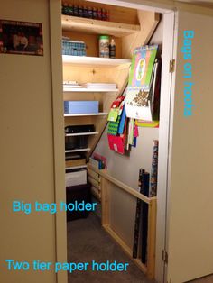 an open door to a small room with shelves