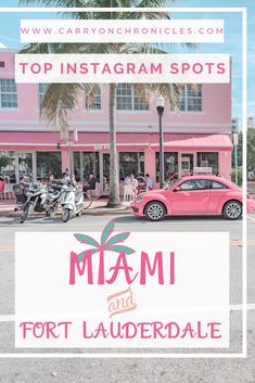 a pink car parked in front of a palm tree on the side of a road