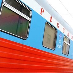 a blue and red train with the word pock written on it's side