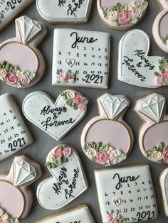 decorated cookies with wedding date and names on them for the bride and groom to share