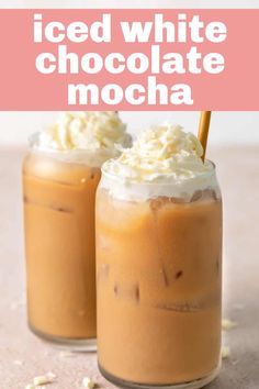 two iced white chocolate mochas with whipped cream on top