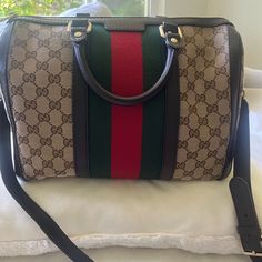 Gucci Boston Gucci Gg Supreme Monogram Leather Trim Web Boston Bag With Strap Included. Authentic Gucci Bag With Receipt Included. Bag Purchased As A Sentimental Gift To Myself, Ready To Extend Family So Putting For Sale. I Don’t Smoke Or Have Pets. Pen Stain Inside, Otherwise Great Condition. Measures 13”L X 7”W X 9” H Bag Drop 3.5. Strap Adjustable, Original With Bag. Gucci Bag Vintage, Pen Stain, Monogrammed Leather, Boston Bag, Sentimental Gifts, Leather Trims, Boston, Gucci Bag, Bag Lady