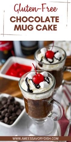 two cups filled with chocolate pudding and topped with whipped cream, cherries and chocolate chips