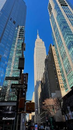 skyscrapers in new york city against a blue sky