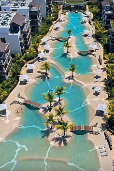 an aerial view of a beach resort and lagoon