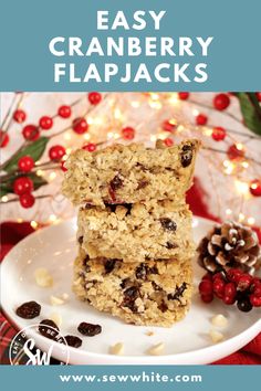 easy cranberry flapjacks recipe on a plate with berries and pine cones