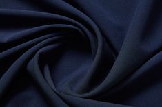 a close up shot of the fabric in dark blue color, it is very soft