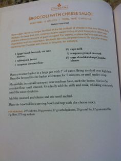 an open book showing instructions for how to make broccoli with cheese sauce in it