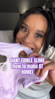 a woman brushing her teeth with an electric toothbrush in front of the camera and text that reads, giant edible slime how to make at home