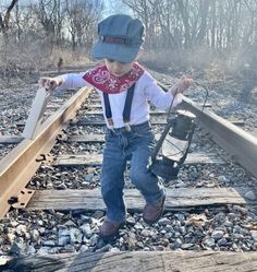 Choose from our Four or Five Piece Deluxe Gift Set (choose from pull down menu): Five Piece Set Includes: Personalized Train Hat, Red Cotton Bandanna, Personalized Wood Train Whistle, Personalized Train Ticket and Gift Card **NOTE: THE TRAIN SIGN AND AMERICAN FLAG SHOWN IN THE PHOTO ARE PHOTO PROPS AND NOT INCLUDED Our Deluxe Train Gift Set is perfect for the little train enthusiast. Here is what makes our sets special: Train Hats: Our high quality, premium train hat with curved sports bill includes either a faux leather laser engraved patch or a black faux leather patch embroidered in the color of your choice with your child's name or "Conductor", "Engineer", etc., if desired.  These hats are high quality; they are not the cheap, thin hats from party stores or discount sites with plastic Diy Train Conductor Costume, Train Engineer Costume, Train Conductor Costume, Engineer Costume, Wooden Train Whistle, Cardboard Train, Train Costume, Train Hat, Engineer Hat