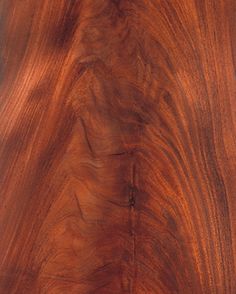 a close up view of a wooden surface