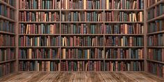 an empty bookshelf filled with lots of books on top of wooden flooring