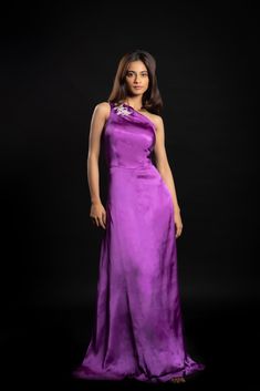 Indulge in sartorial bliss with the purple-coloured Enchanting Alchemist gown. The gown is made with cupro satin and is embellished with hand-crafted beadwork.Details Neckline: One shoulder Material: Cupro satin Lining: Cotton-polyester Made in India What makes this outfit sustainable?This outfit is made with cupro satin; the fabric is made from cotton linter waste. It is a sustainable alternative to polyester. Purple Silk Evening Dress, Silk Purple Evening Dress, Purple Silk Evening Dress With Fitted Bodice, Purple Satin Evening Dress, Silk Evening Dress With Fitted Bodice In Purple, Formal Purple Satin Evening Dress, Purple Satin Formal Gown, Purple Satin Gown For Formal Occasions, Elegant Purple Silk Gown