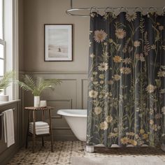 a bath room with a tub and a shower curtain