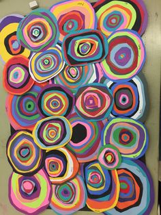 an abstract painting with circles on it