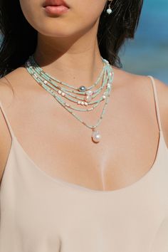 Dotted with natural white puka shells, shimmering gemstones, and golden beads, each of these luxe puka shell gemstone necklaces are one of kind. Each exquisite piece captures the essence of paradise, reminiscent of sun-kissed beaches and gentle ocean breezes. ✦ Choose your Gemstone and Adjustable Length ✦ ✦ DETAILS ✦✧ Name: Ke'alohi (kay ah LO hee) - the brightness. .✧ All golden components 14kt Gold Filled.✧ White Puka Shells.✧ Genuine Gemstones.✧ Due to the nature of the gemstones, each piece may vary from the photos in size/color/shape. Every piece is gorgeous and unique.✧ All Ke Aloha Jewelry pieces come packaged thoughtfully, beautifully, and ready for gift giving.✧ Unless otherwise noted in the listing description, all pieces are sold individually. Photos with models/multiple pieces Unique Choker Necklaces, Unique Choker, Dainty Gemstone Necklace, Floating Pearl Necklace, Gemstone Choker Necklace, Puka Shell Necklace, Turquoise Choker, Amazonite Necklace, Gemstone Choker